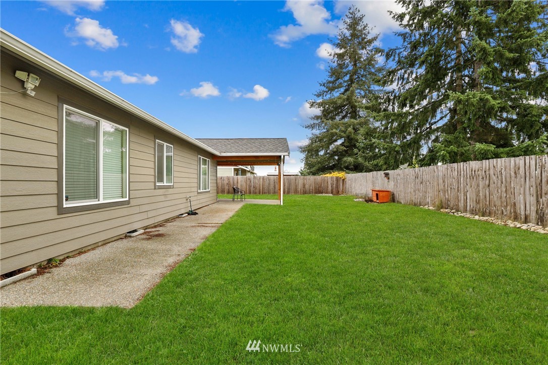 9327 179th Way Southwest Rochester, WA 98579 - Photo 20 of 20 a view of a house with a backyard