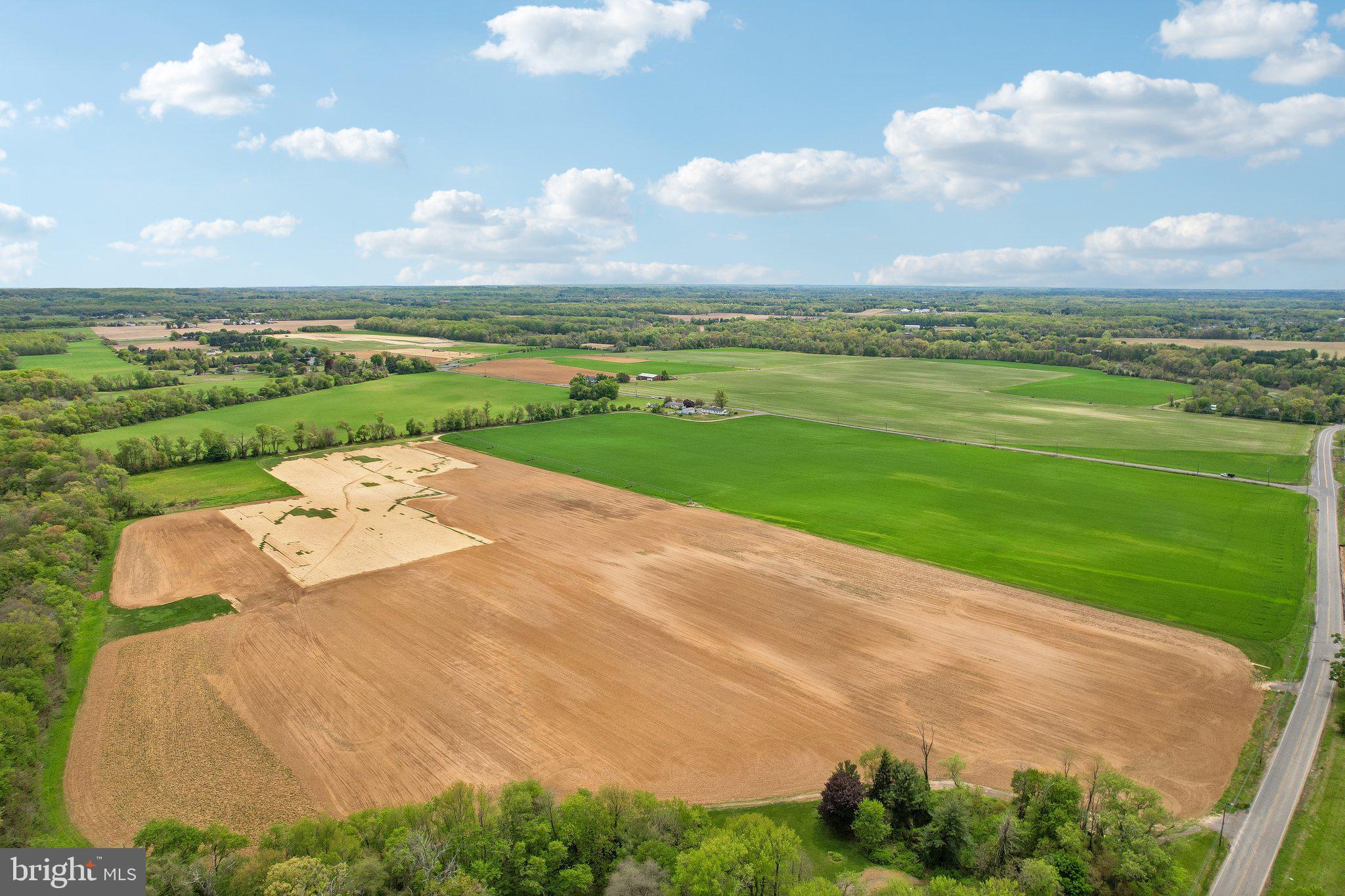 1272 Old York Road Hightstown, NJ 08520 - Photo 15 of 39 Vast fields under a bright sky.