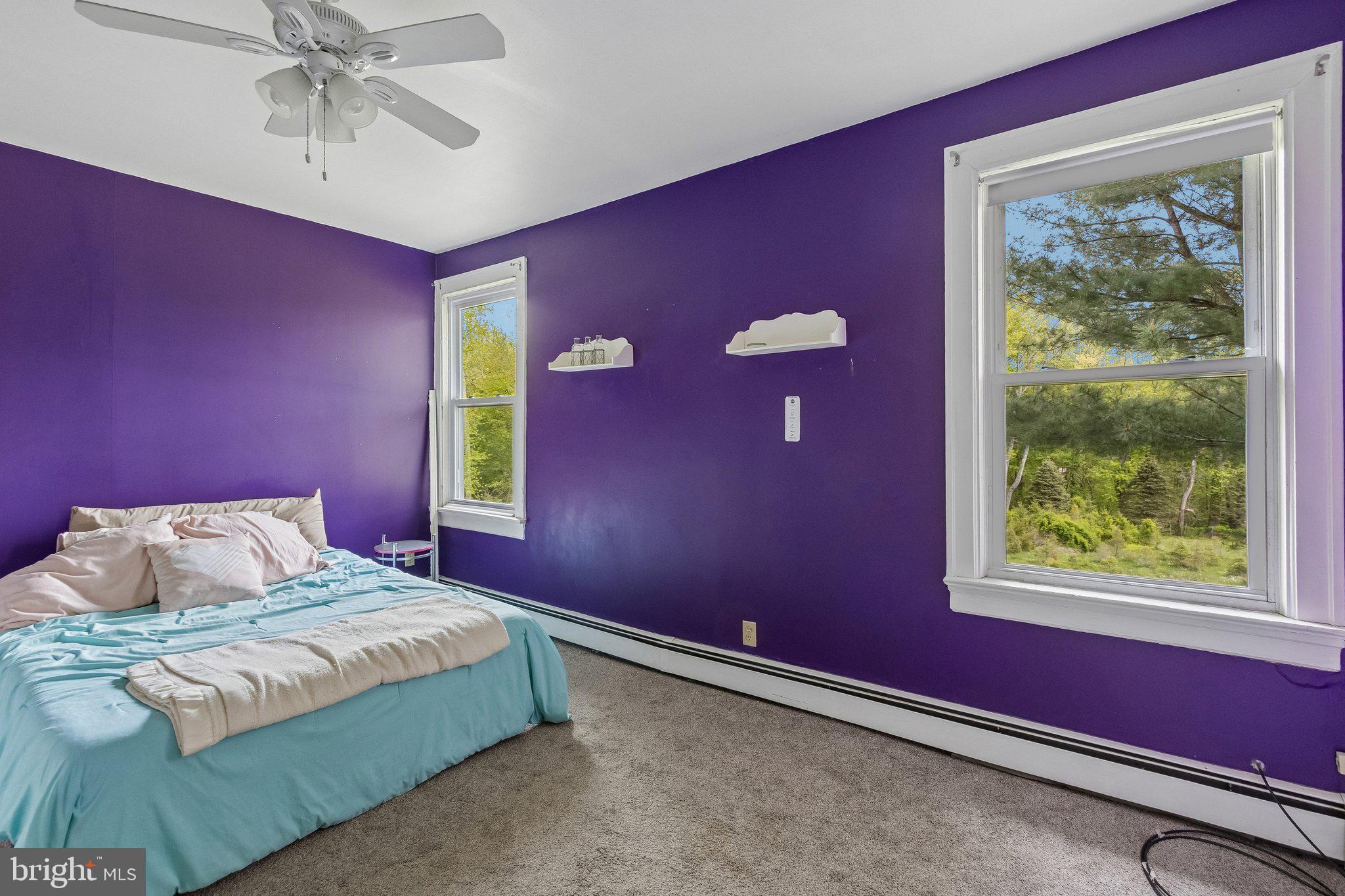 1272 Old York Road Hightstown, NJ 08520 - Photo 4 of 39 Vibrant purple retreat with nature views.