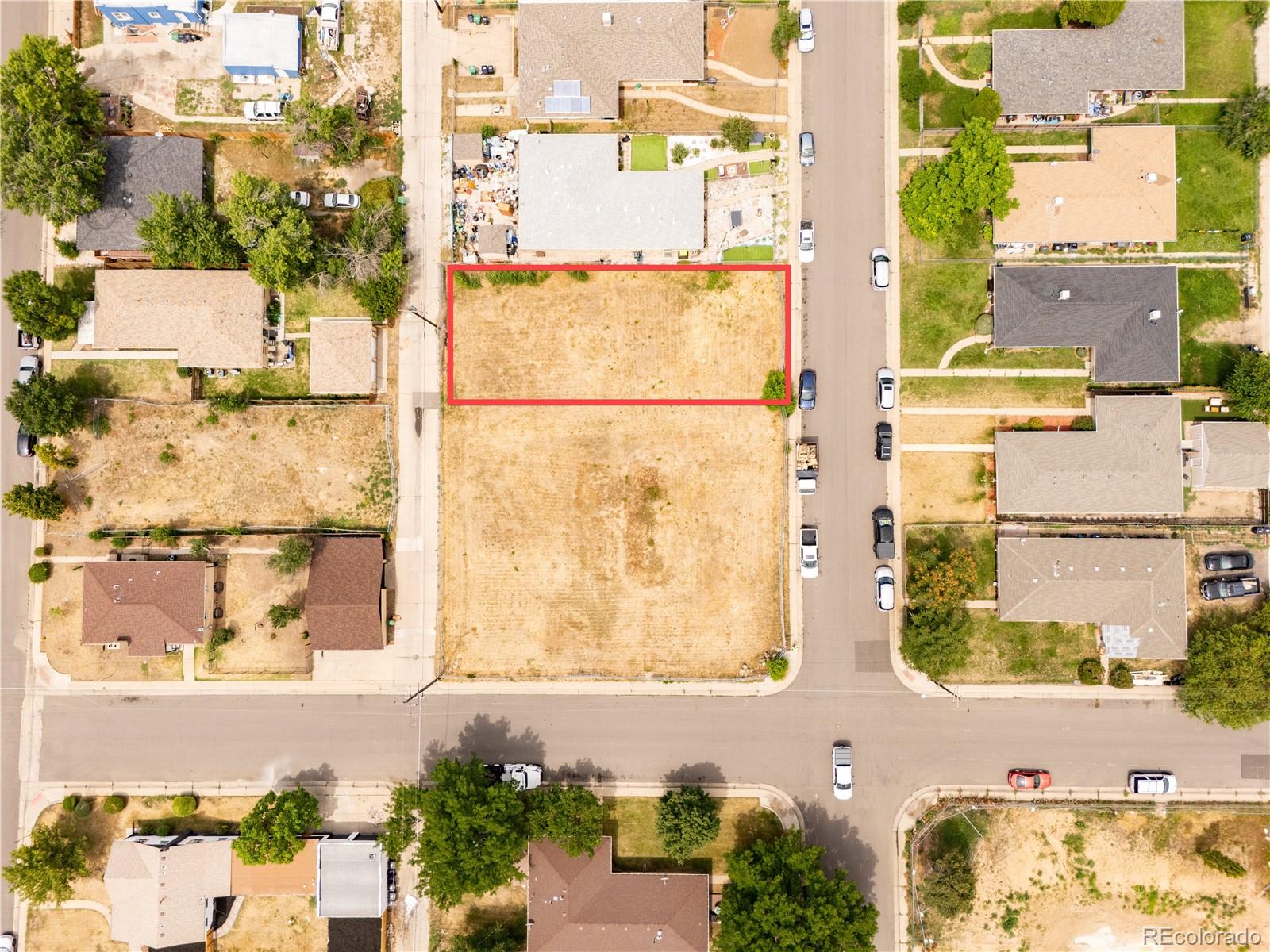 3611 Grape Street Denver, CO 80207 - Photo 1 of 9 an aerial view of a houses with a yard