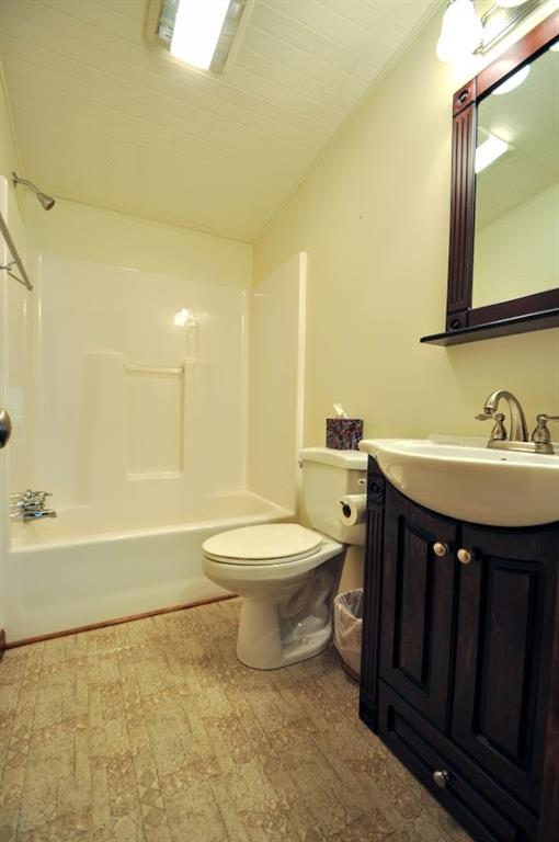 311 Cope Road Perryopolis, PA 15473 - Photo 25 of 47 a bathroom with a sink a toilet and shower