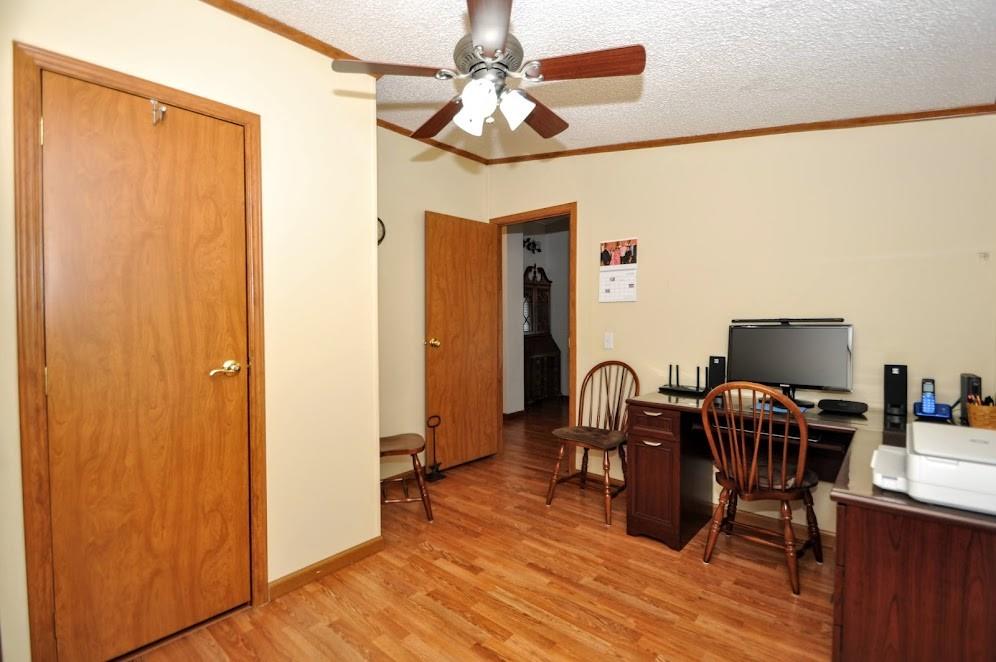 311 Cope Road Perryopolis, PA 15473 - Photo 26 of 47 a workspace with chandelier