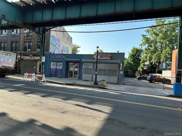 a view of a car park in front of a building