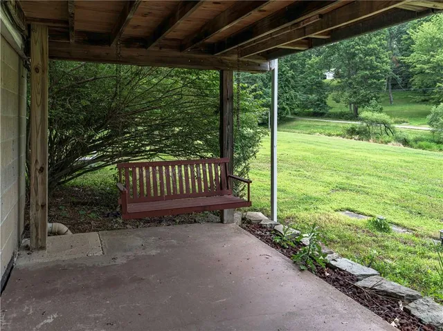 a garden view with a seating space