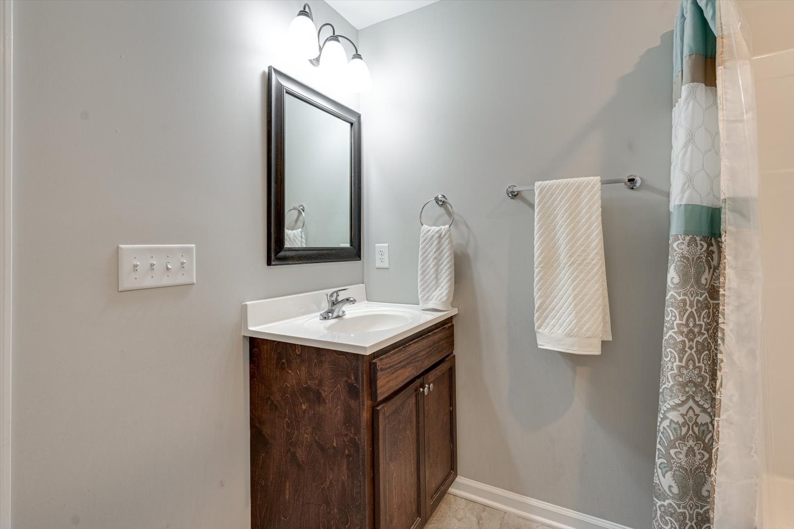 106 Wilder Chapel Road Decherd, TN 37324 - Photo 18 of 29 a bathroom with a sink a mirror and vanity