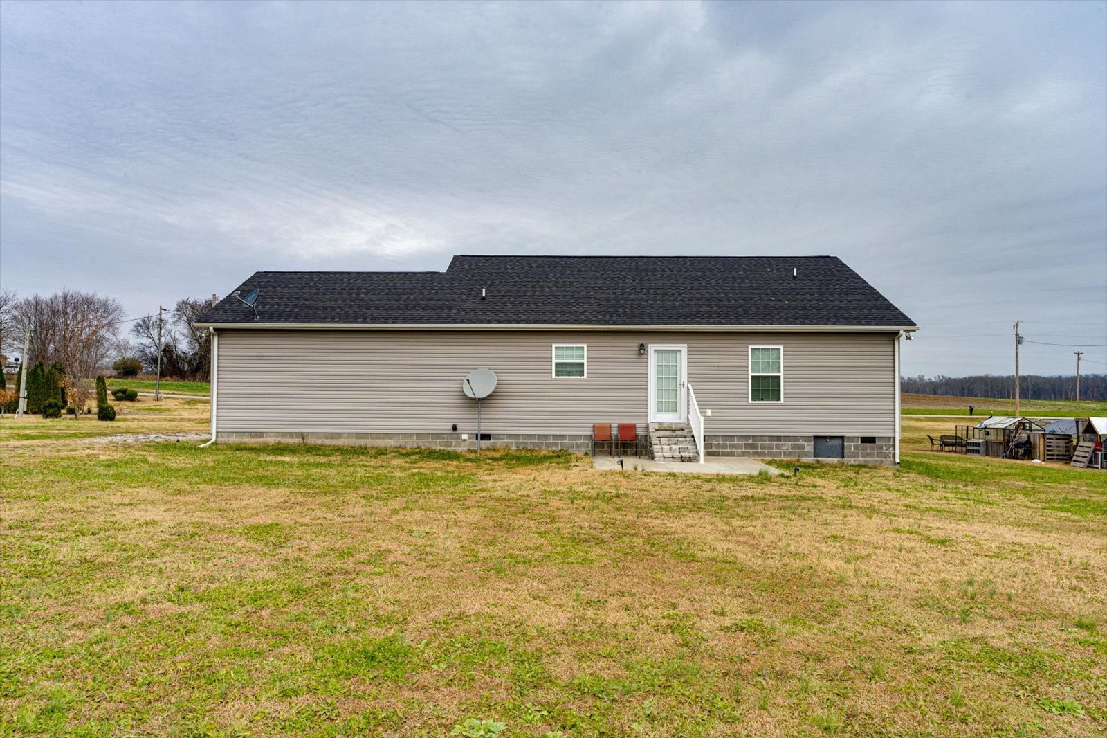 106 Wilder Chapel Road Decherd, TN 37324 - Photo 23 of 29 a house that has a large pool