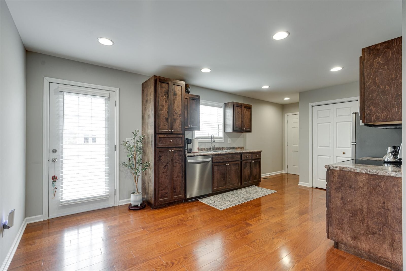 106 Wilder Chapel Road Decherd, TN 37324 - Photo 9 of 29 a large kitchen with stainless steel appliances granite countertop a refrigerator and a stove top oven