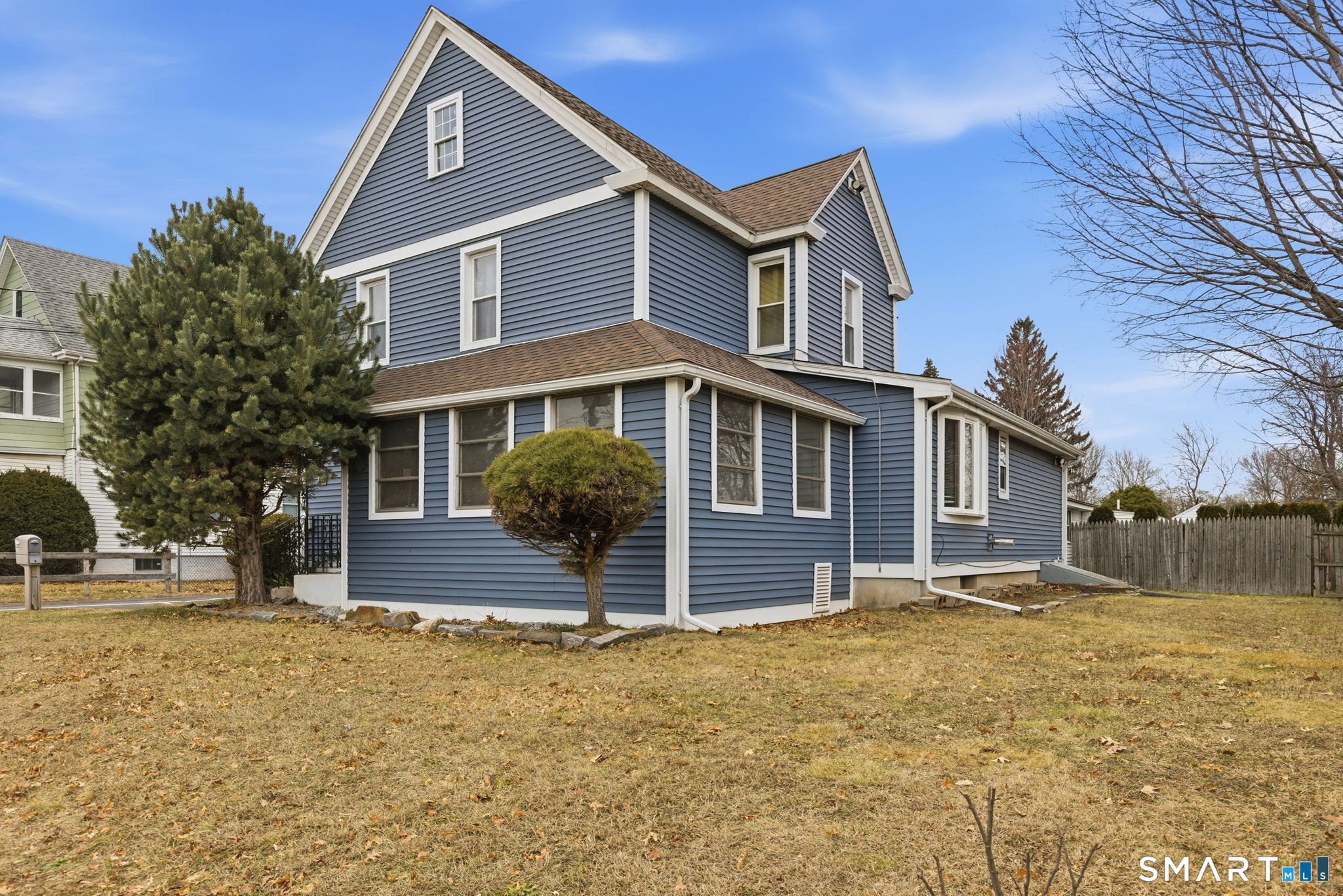 44 East Cedar Street Newington, CT 06111 - Photo 3 of 26 a front view of a house with a yard