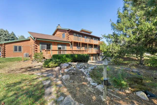 a kitchen with stainless steel appliances granite countertop a sink and a cabinets