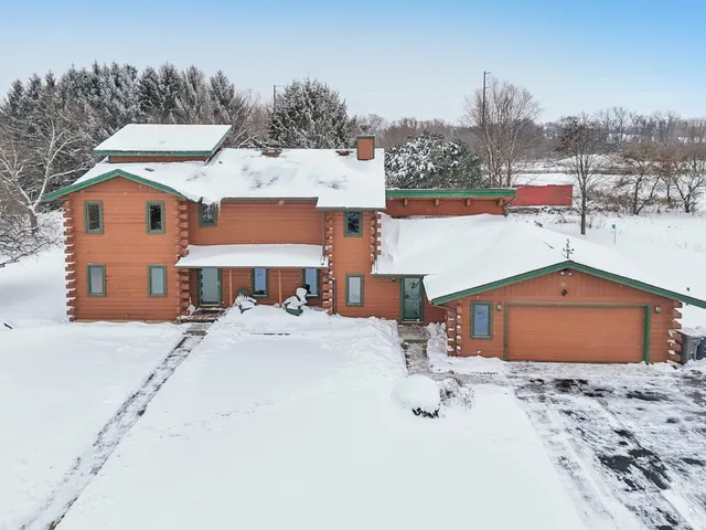 a living room with furniture window and wooden floor