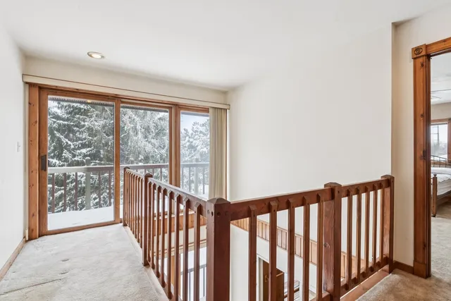 a bathroom with a toilet and a bathtub