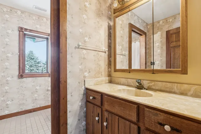 an empty room with a empty space and a window