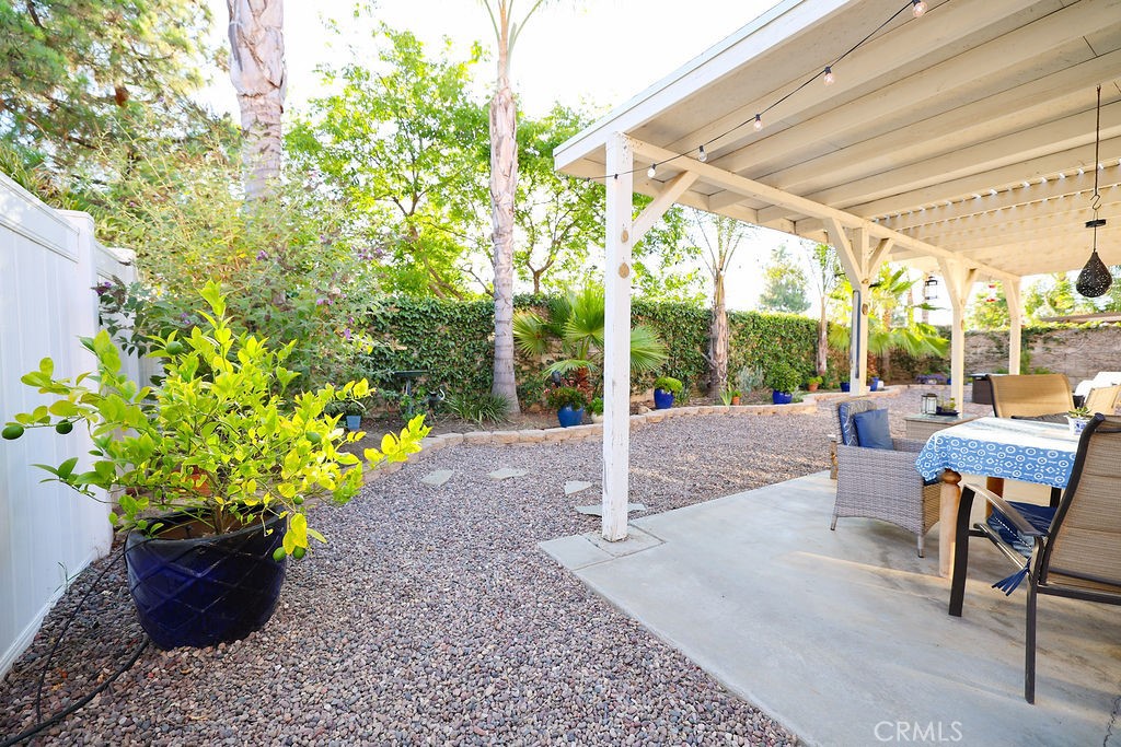 9057 Mandarin Lane Riverside, CA 92508 - Photo 31 of 38 Backyard with covered patio