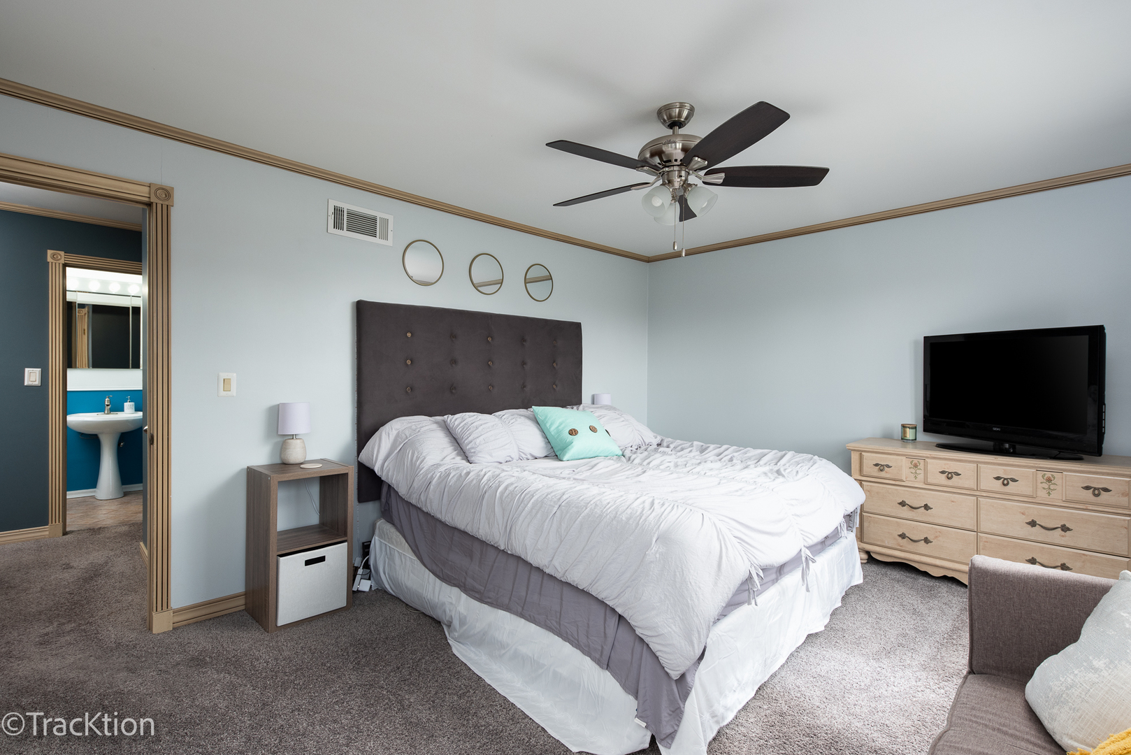 420 Circlegate Road, Unit 420 New Lenox, IL 60451 - Photo 10 of 16 a bedroom with a bed and a flat screen tv