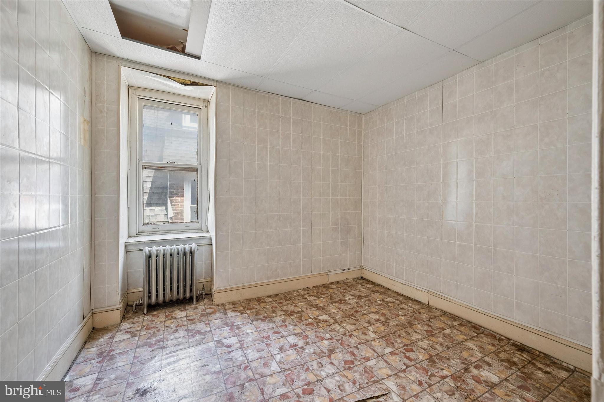 4511 Chester Avenue Philadelphia, PA 19143 - Photo 30 of 35 an empty room with windows