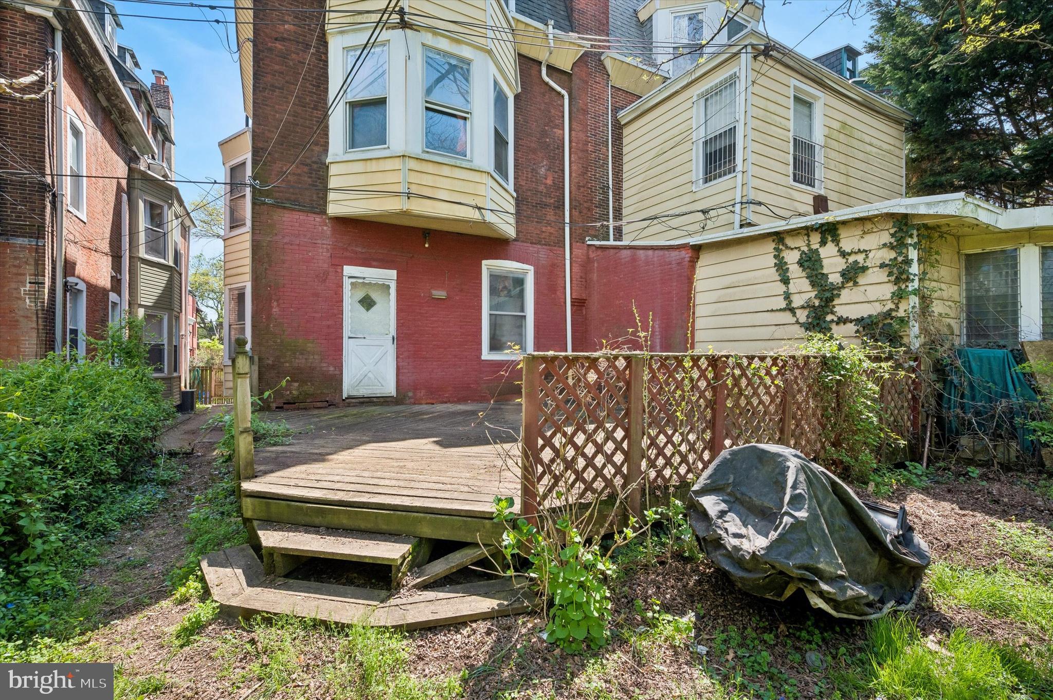 4511 Chester Avenue Philadelphia, PA 19143 - Photo 35 of 35 a front view of a house with a garden