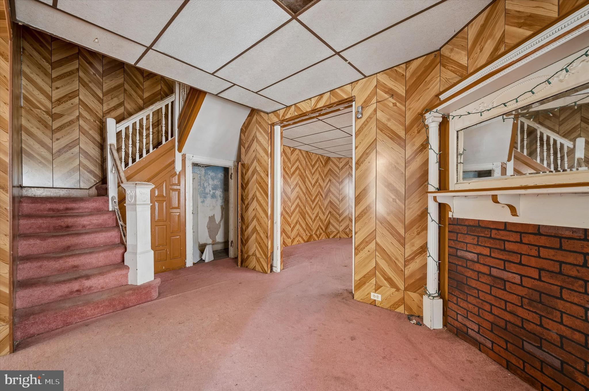 4511 Chester Avenue Philadelphia, PA 19143 - Photo 8 of 35 a view of an empty room with stairs