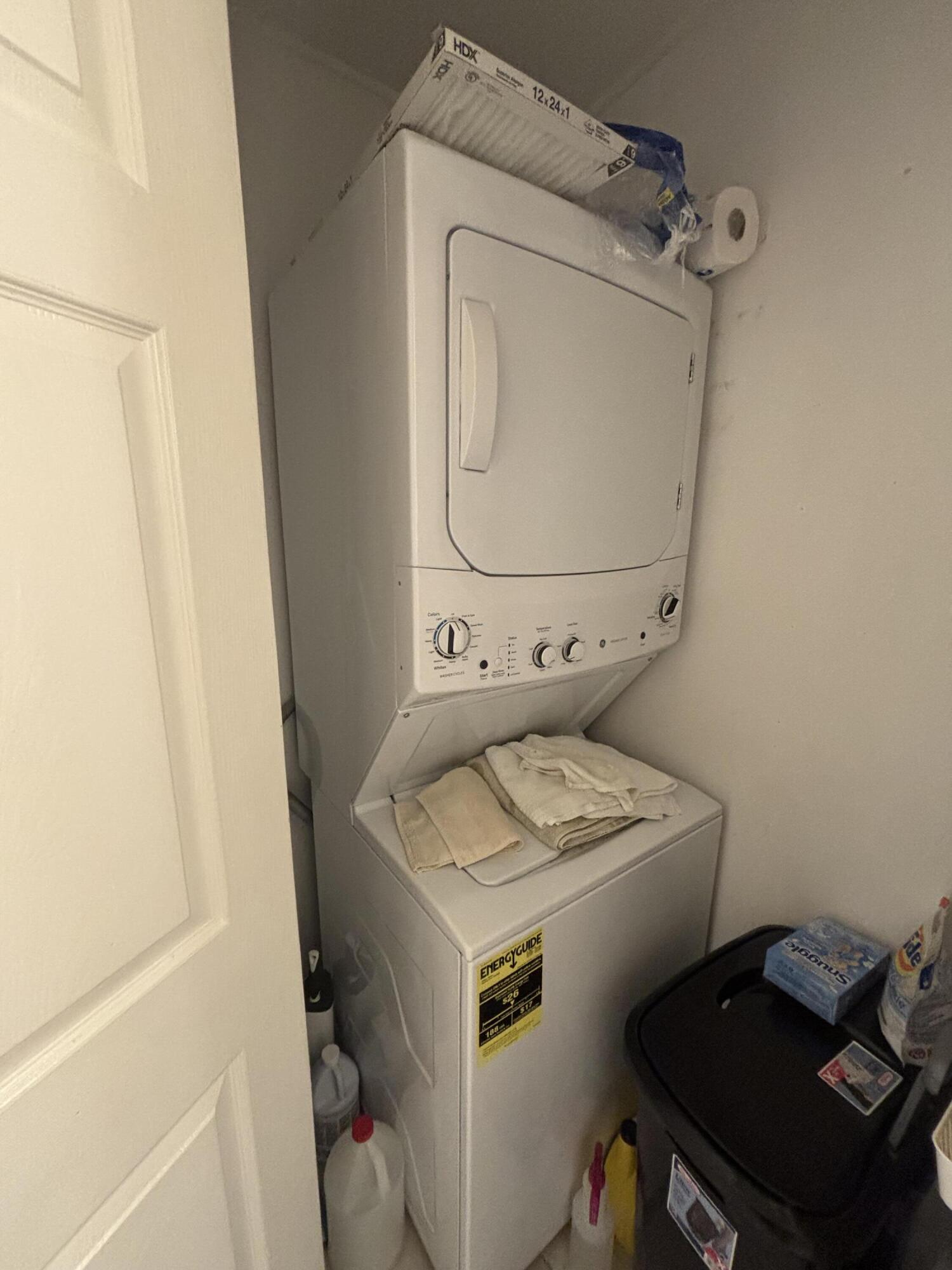 8833 Bella Vista Drive, Unit 8833 Boca Raton, FL 33433 - Photo 28 of 47 a utility room with dryer and washer