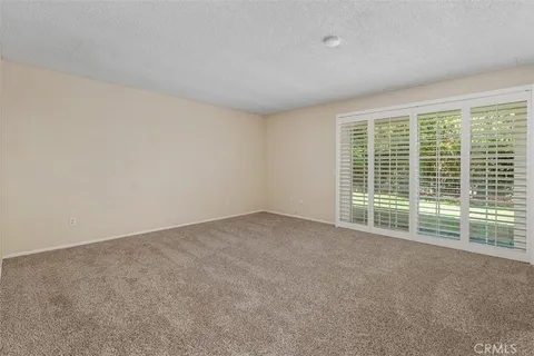 a view of a room with a large window