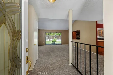 a view of a hallway with windows