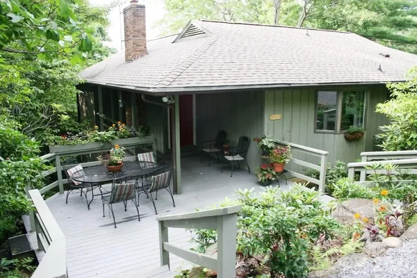 a view of a living room and dining room