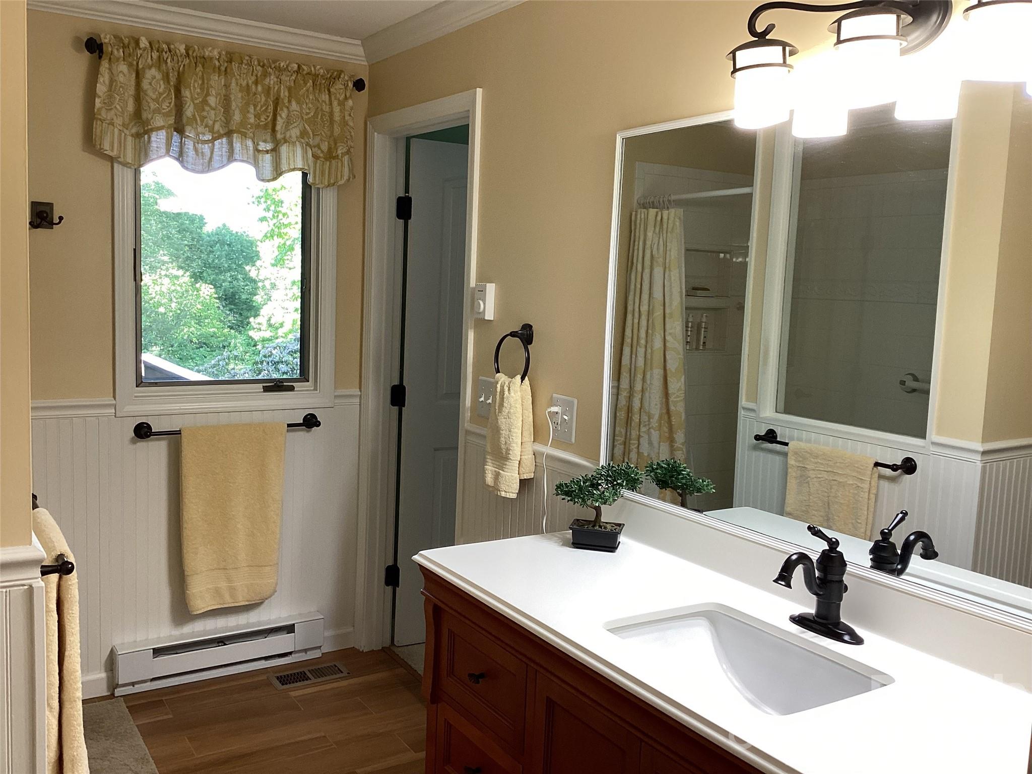 31 Rhododendron Road Black Mountain, NC 28711 - Photo 18 of 27 a bathroom with a sink and a mirror