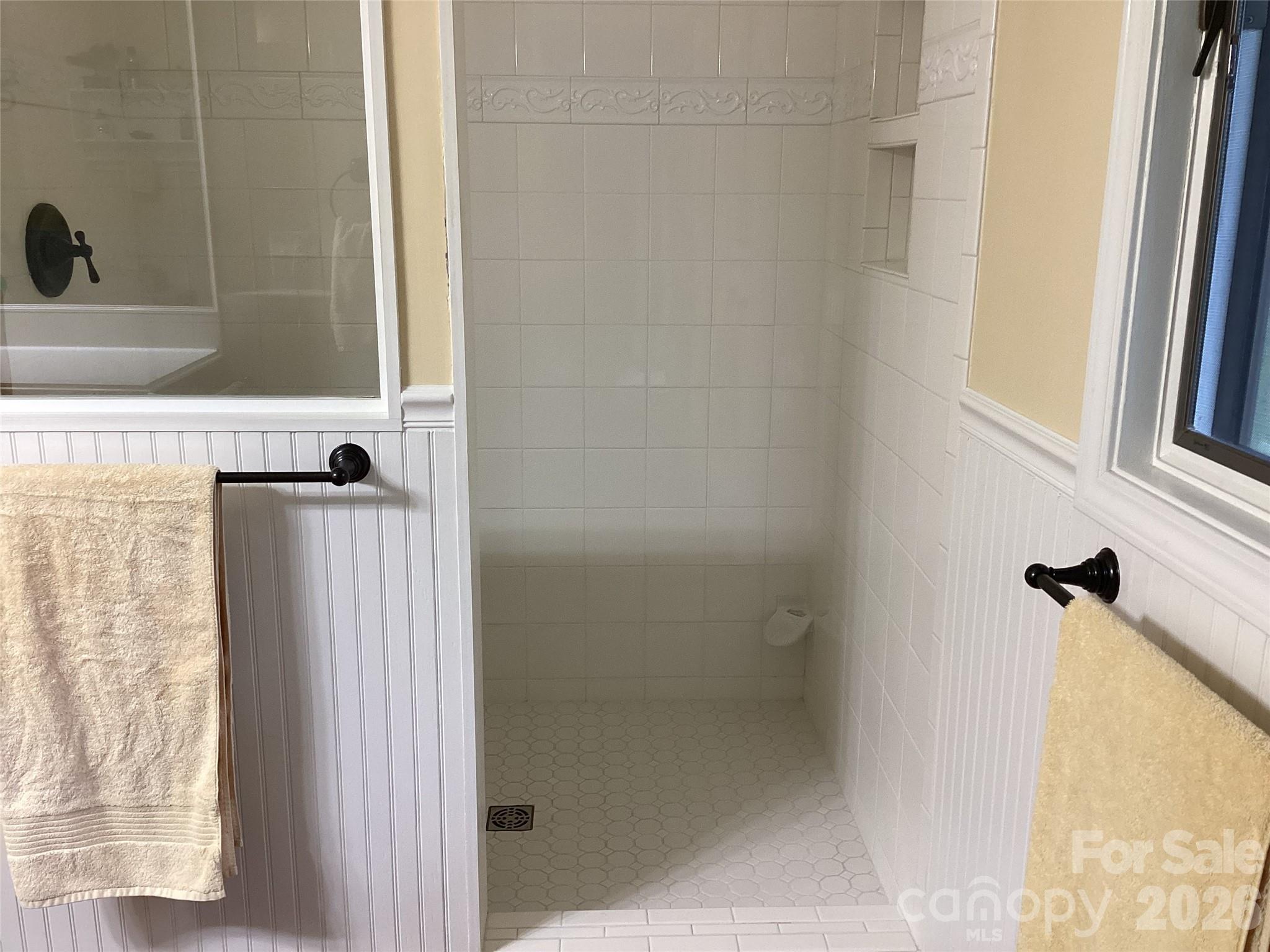 31 Rhododendron Road Black Mountain, NC 28711 - Photo 19 of 27 a bathroom with a shower