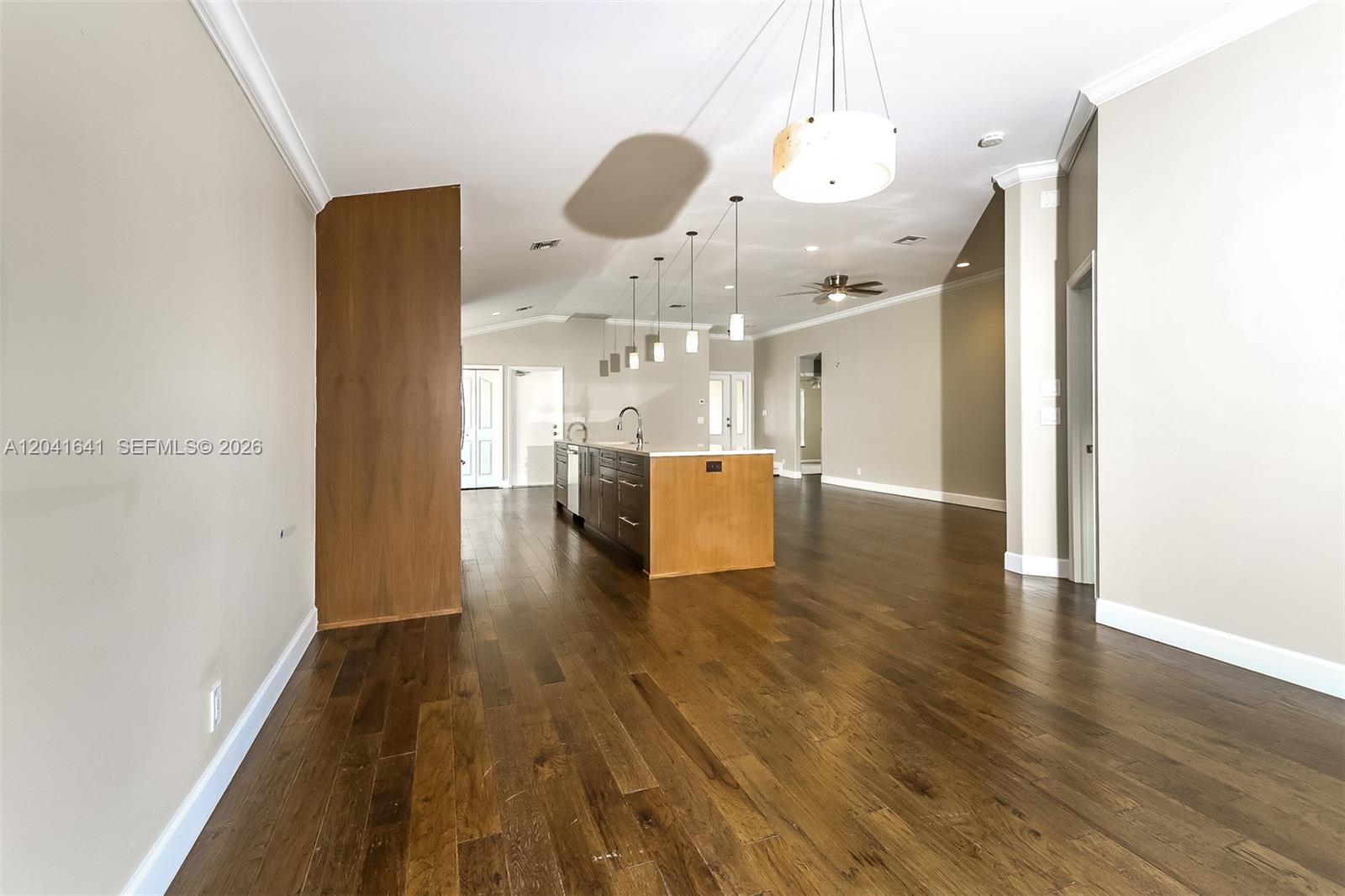 6484 Robinson Street Jupiter, FL 33458 - Photo 5 of 15 a view of a kitchen with wooden floor