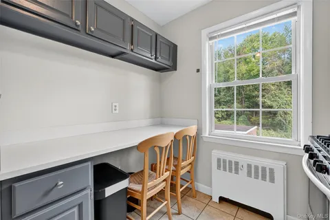 a kitchen with stainless steel appliances granite countertop a stove and a microwave