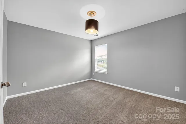 a white bath tub sitting next to a window