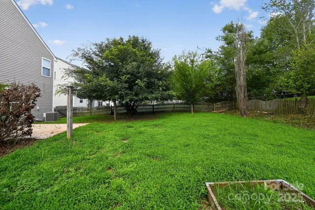a view of a backyard with a garden