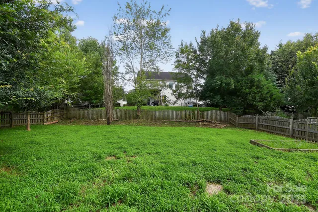 a view of a backyard with a garden