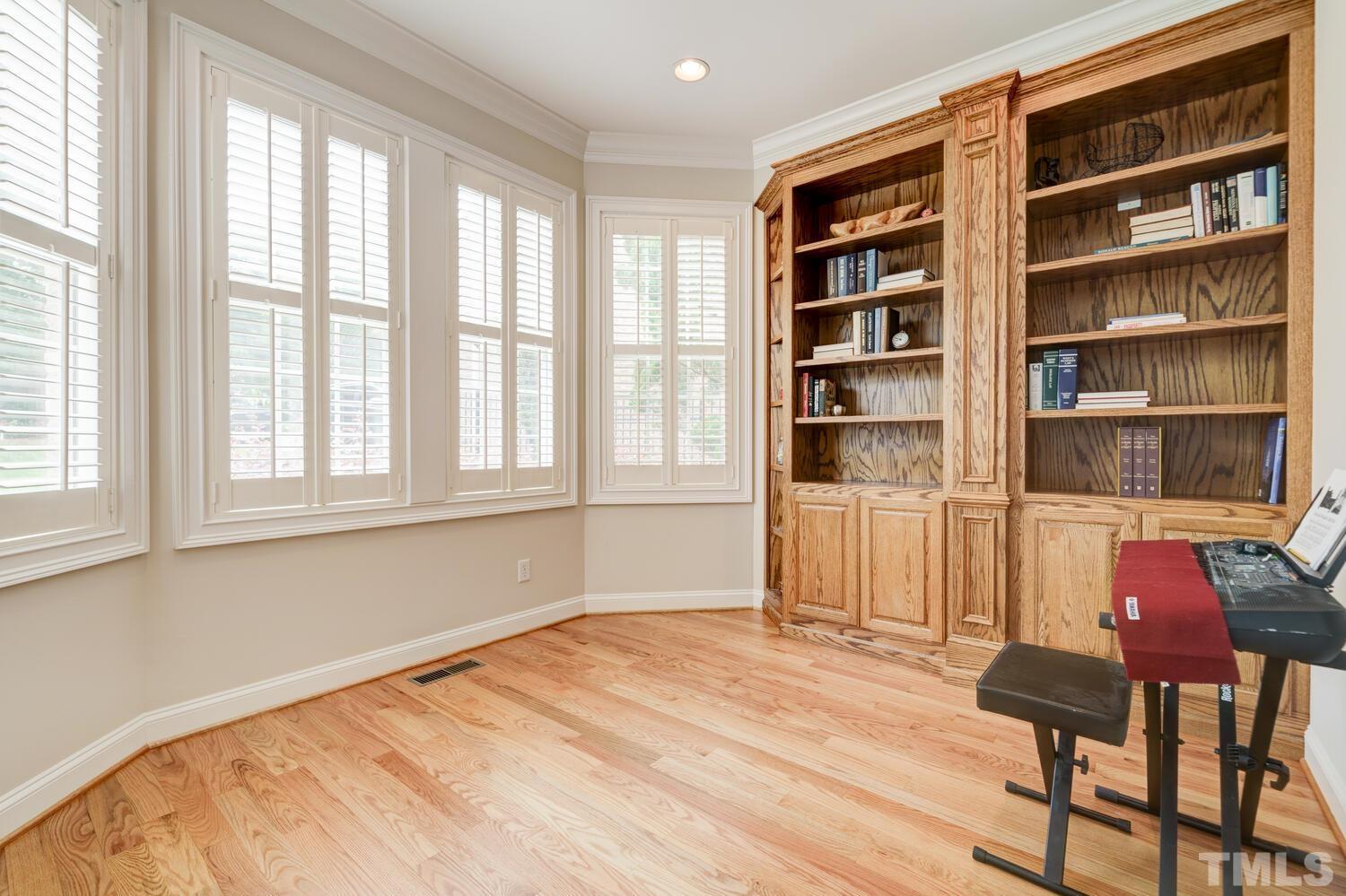 3907 Morvan Way Raleigh, NC 27612 - Photo 21 of 69 a view of a livingroom with furniture and closet