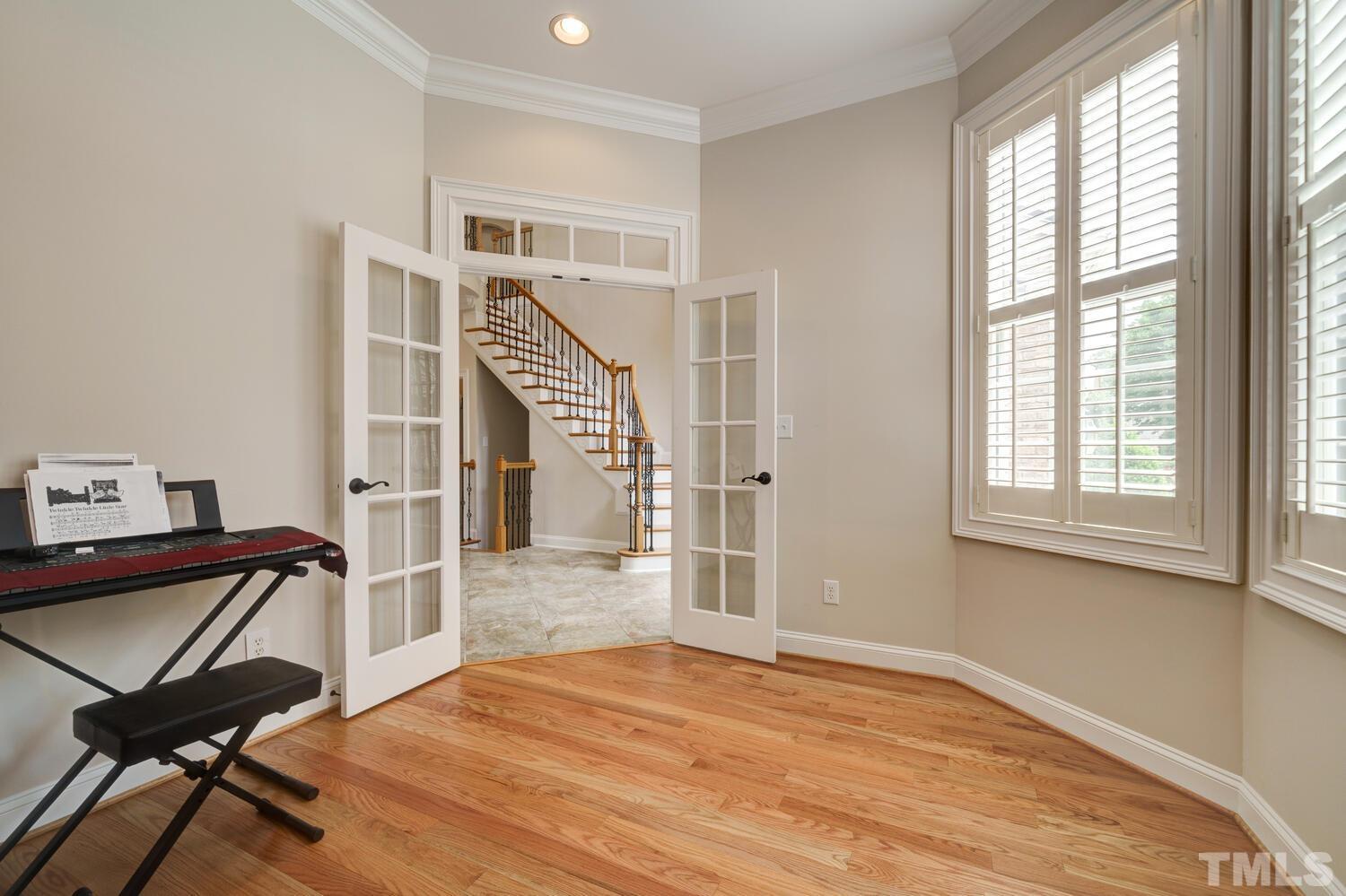 3907 Morvan Way Raleigh, NC 27612 - Photo 22 of 69 a view of a livingroom with furniture and a window