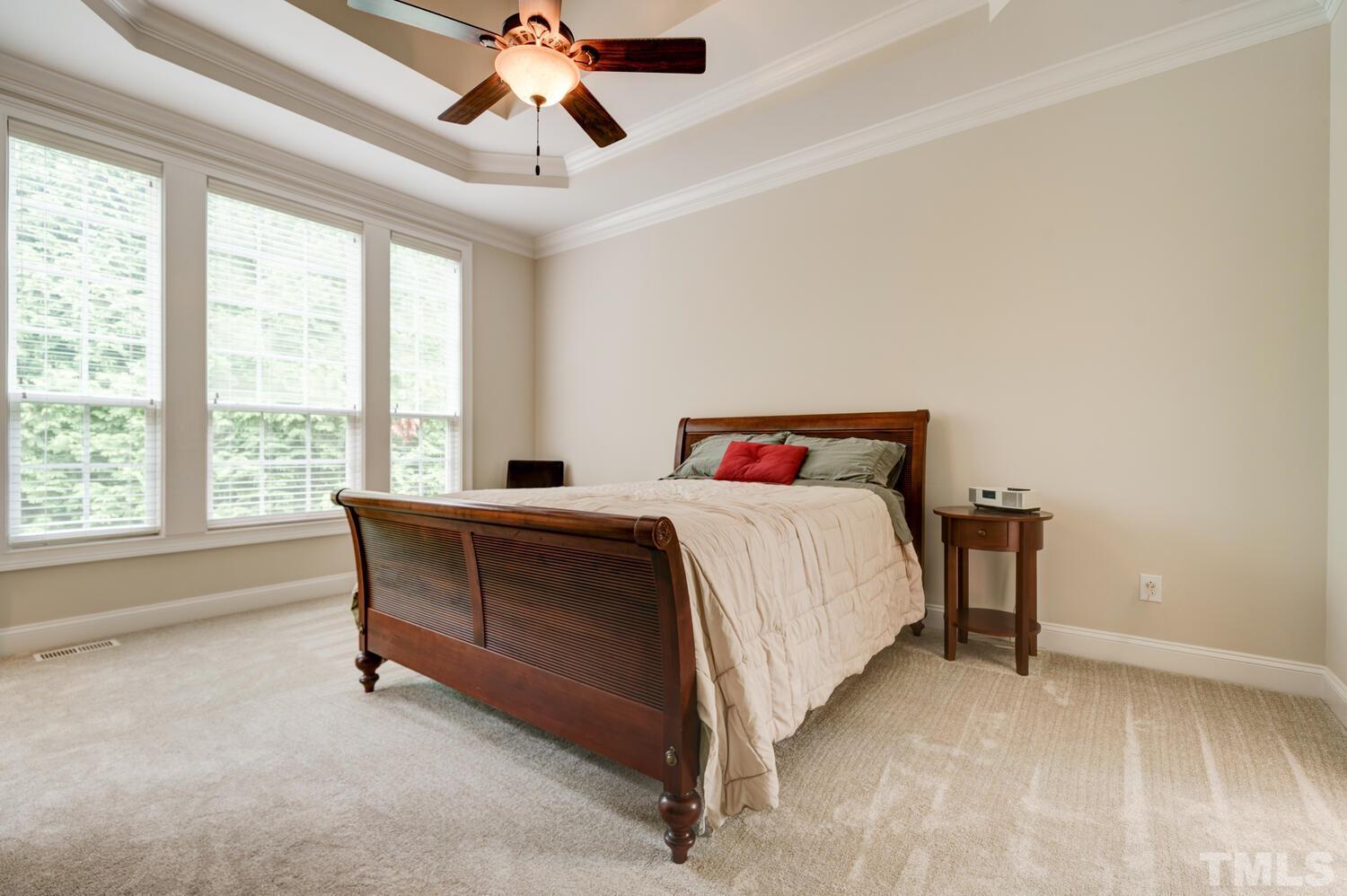 3907 Morvan Way Raleigh, NC 27612 - Photo 23 of 69 a bedroom with a bed and a window