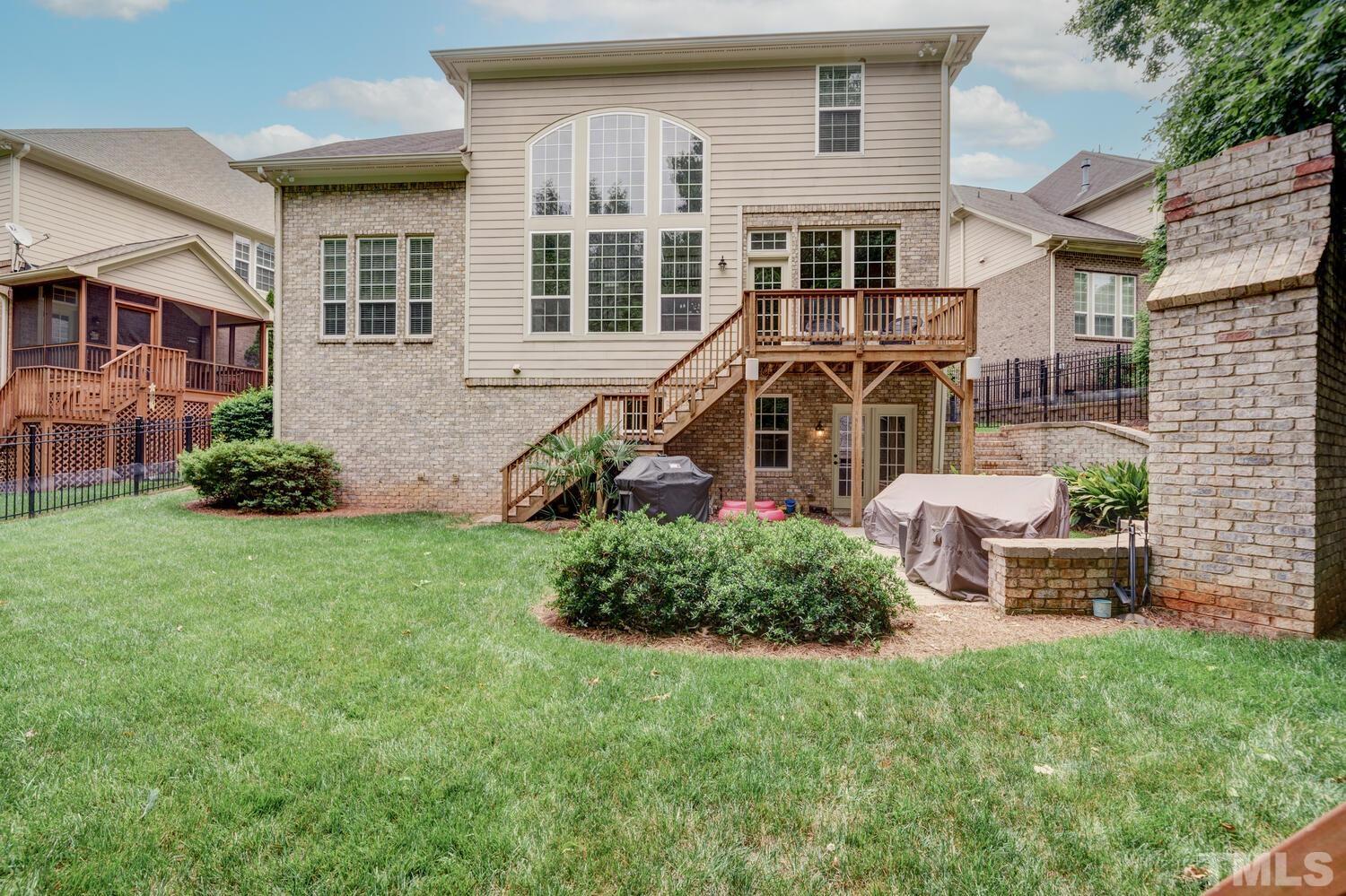 3907 Morvan Way Raleigh, NC 27612 - Photo 58 of 69 front view of a house with a yard