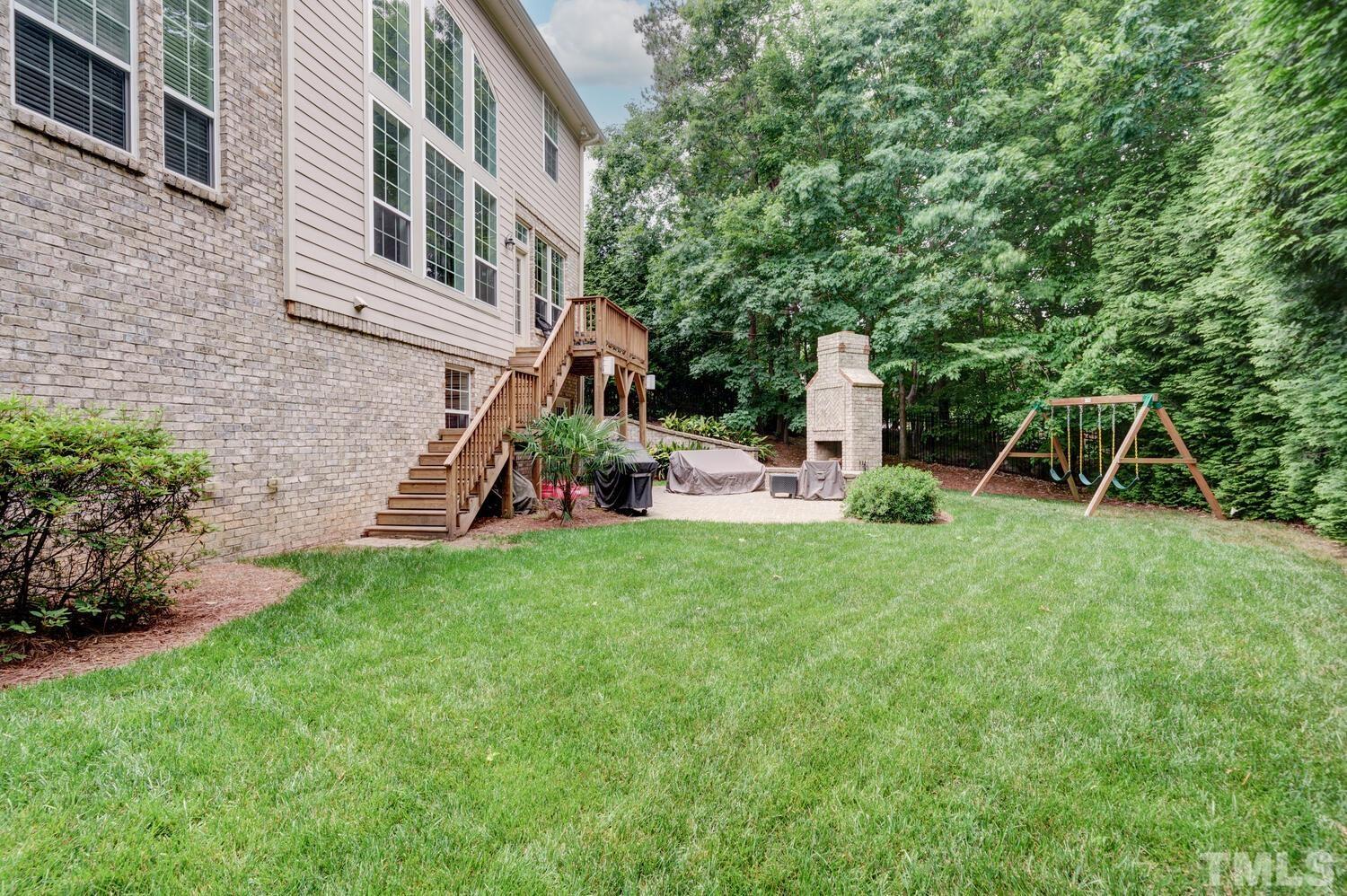 3907 Morvan Way Raleigh, NC 27612 - Photo 59 of 69 a view of a house with backyard and sitting area