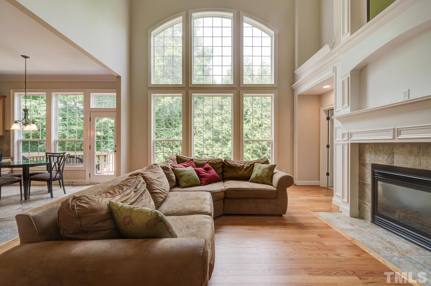 3907 Morvan Way Raleigh, NC 27612 - Photo 6 of 69 a living room with furniture and a fireplace