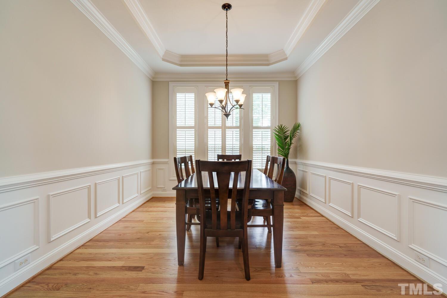 3907 Morvan Way Raleigh, NC 27612 - Photo 9 of 69 a view of a dining room with furniture window and wooden floor