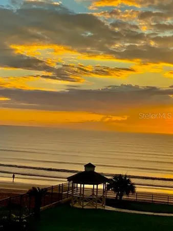 a view of an ocean from a beach