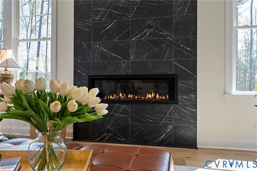 5012 Lake Summer Loop Moseley, VA 23120 - Photo 19 of 67 a vase of flowers sitting on a shelf