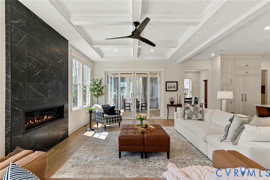 5012 Lake Summer Loop Moseley, VA 23120 - Photo 21 of 67 a living room with furniture a fireplace and a large window