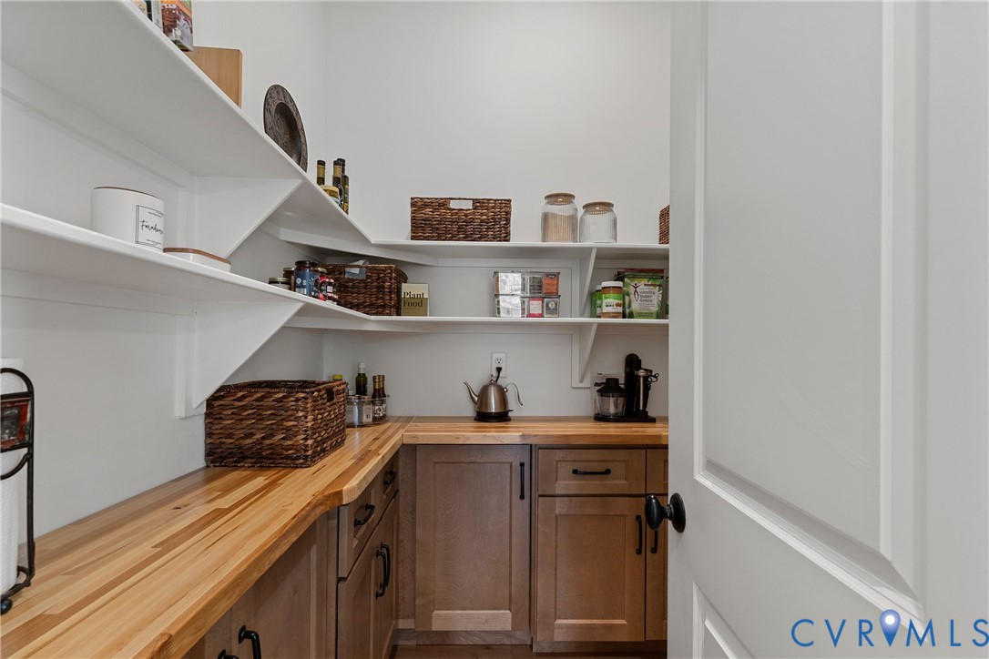 5012 Lake Summer Loop Moseley, VA 23120 - Photo 30 of 67 a kitchen with a cabinets and white appliances