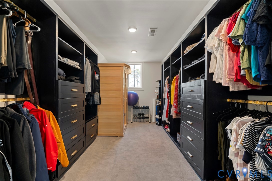 5012 Lake Summer Loop Moseley, VA 23120 - Photo 39 of 67 a view of walk in closet with clothes and shoes