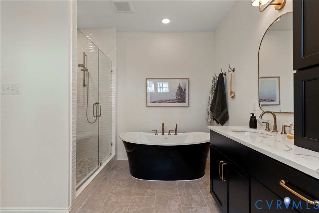 5012 Lake Summer Loop Moseley, VA 23120 - Photo 43 of 67 a bathroom with a sink double vanity and a mirror