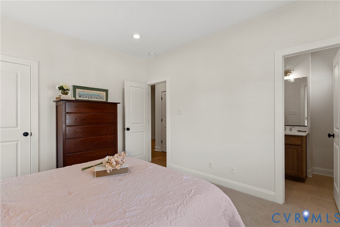 5012 Lake Summer Loop Moseley, VA 23120 - Photo 54 of 67 a bedroom with a bed and a dresser