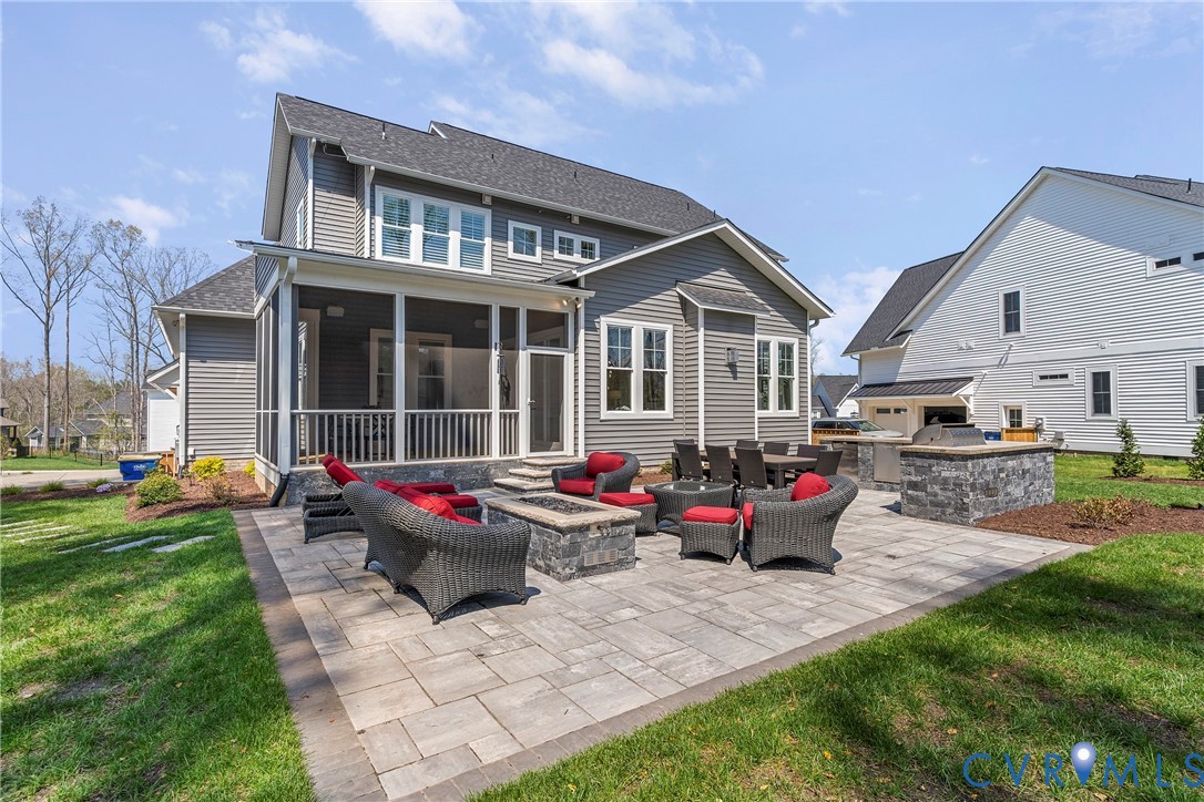 5012 Lake Summer Loop Moseley, VA 23120 - Photo 61 of 67 a front view of a house with yard and sitting area