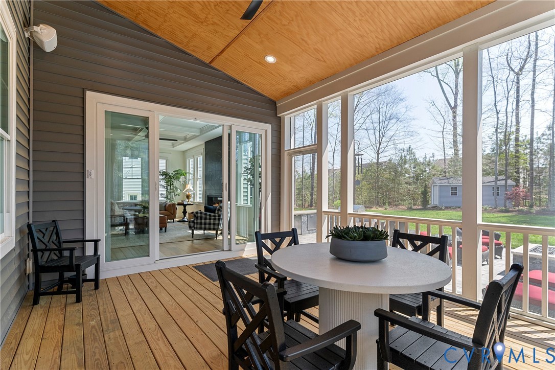 5012 Lake Summer Loop Moseley, VA 23120 - Photo 63 of 67 a view of a dining room with furniture and wooden floor