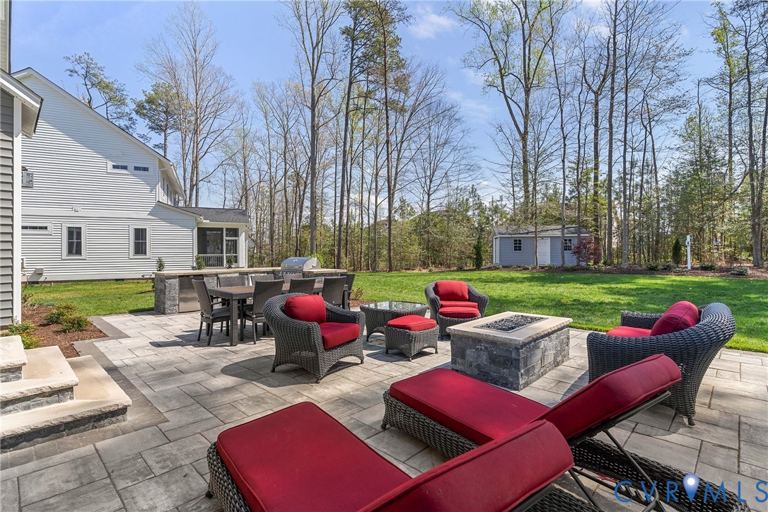 5012 Lake Summer Loop Moseley, VA 23120 - Photo 64 of 67 a view of a patio with swimming pool