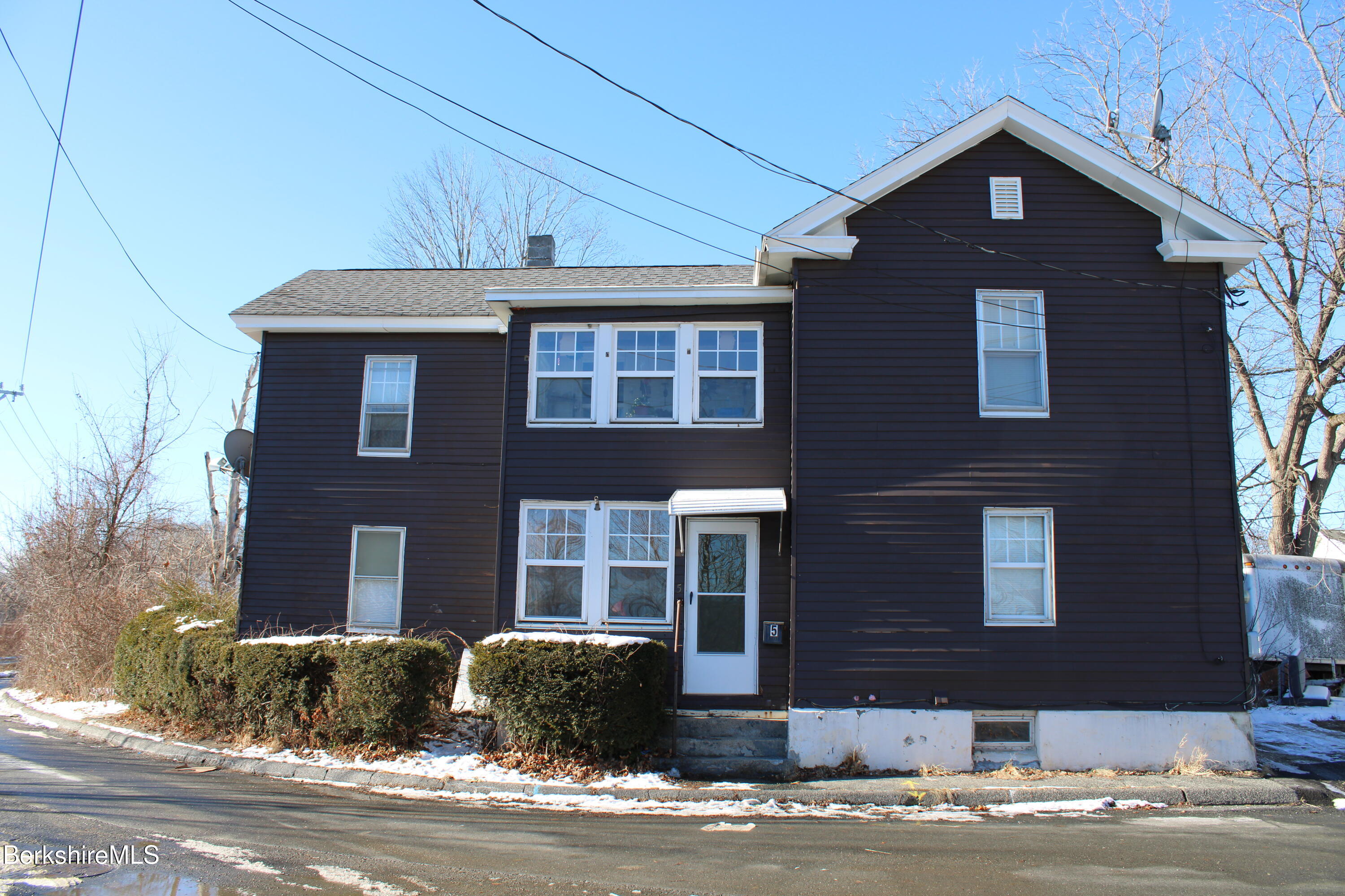 3-5 Pleasant Street Pittsfield, MA 01201 - Photo 1 of 40 a front view of a house with a yard